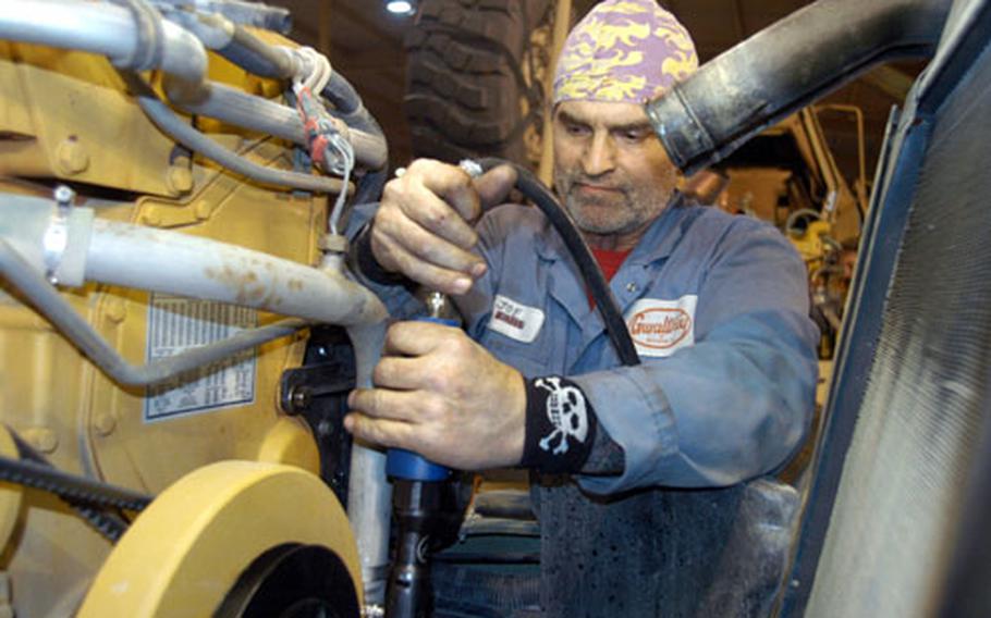 Joe Neuner, a boilermaker by trade at the Norfolk Naval Shipyard in Virginia, volunteered to deploy to Kuwait to up-armor tactical vehicles. "I never was in the military, so I'm helping out by doing this," he said.