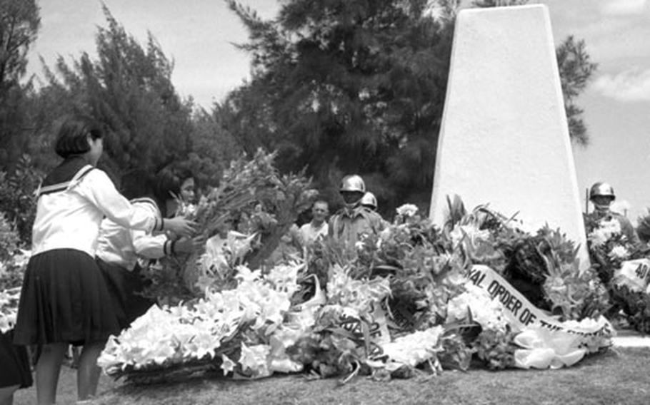 Ruth Cortez of the Philippine-American Veterans Association placed a wreath at the Ernie Pyle monument.
