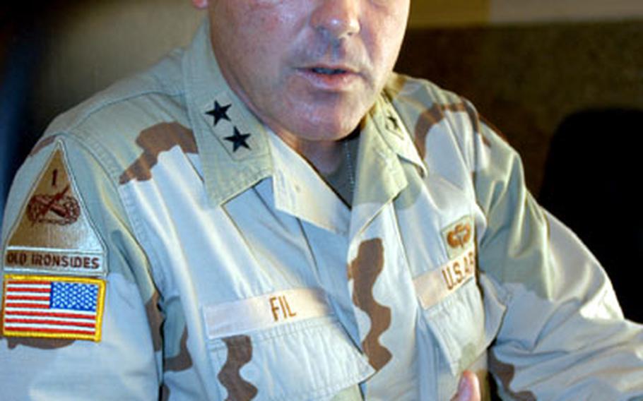 U.S. Army Maj. Gen. Joseph Fil, commanding general of the Civilian Police Assistance Training Team, is putting together an Iraqi police force by “learning from current events.”