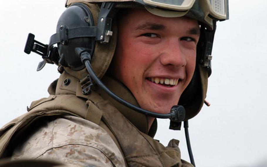Cpl. Chris Campbell, 21, is a driver of an Amphibious Assault Vehicle. The tracked vehicles are easy enough to drive, he said, and his favorite part is taking sharp turns to jostle the passengers.