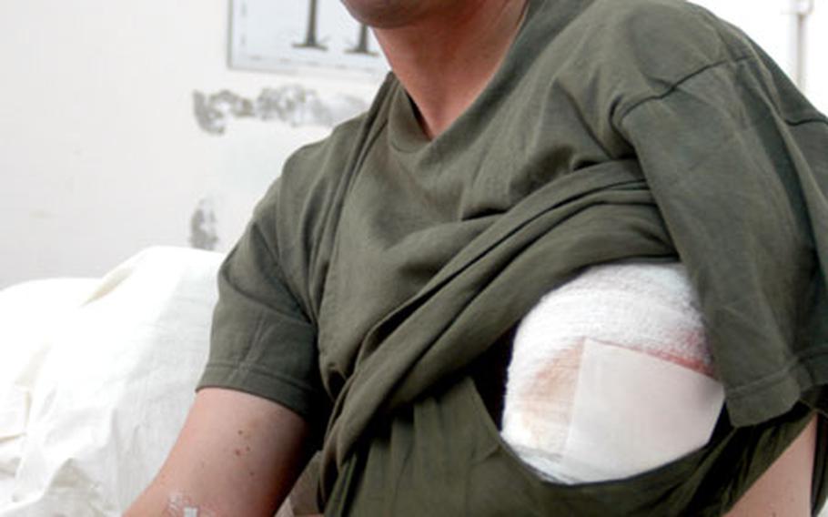 Gunnery Sgt. Brendan Slattery, 31, was wounded Tuesday afternoon in a roadside bomb explosion while patrolling a dangerous stretch of highway between Baghdad and Fallujah. Slattery sustained a shrapnel wound to his left arm, but should rejoin his unit in about a week.
