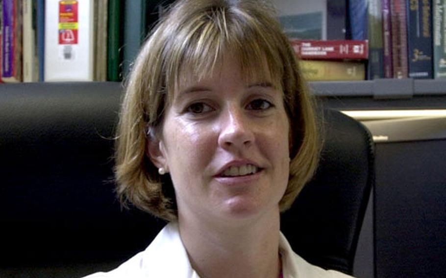Capt. Christine Waasdorp, staff pediatrician at the 121st General Hospital at Yongsan Garrison, South Korea, worked to bring the Reach Out and Read program to the hospital.
