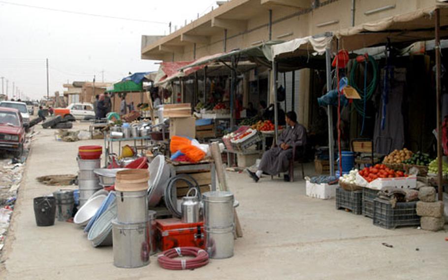 The marketplace in the town of Tal Abtha has reopened and residents are returning to business as usual after U.S. soldiers with Battery C, 2nd Battalion, 8th Field Artillery, 1st Brigade, 25th Infantry Division, began patrolling about two months ago in the former insurgent stronghold.