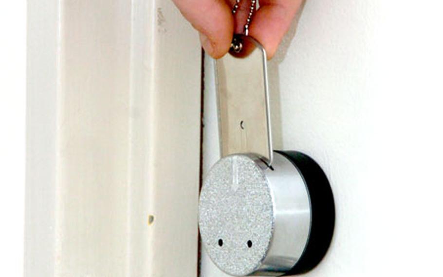 Yokota Air Base tower residents are using newly installed locks on their doors.