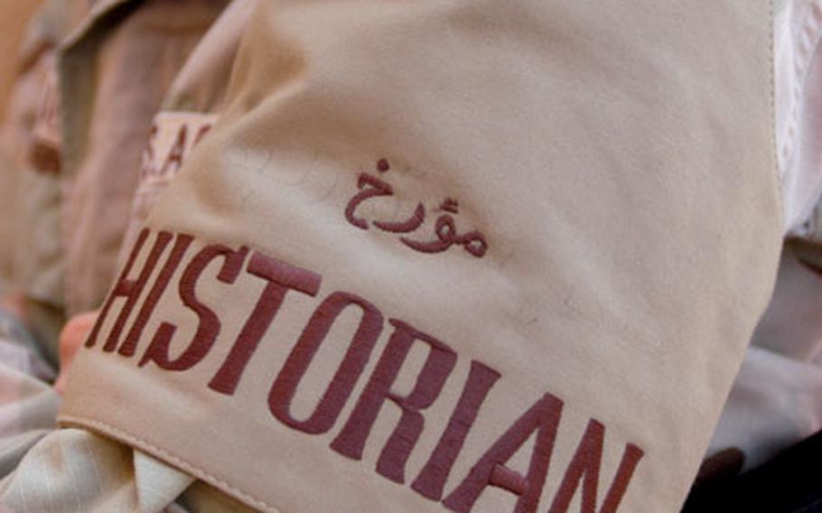 While historians were mobilized during World War I, the effort to document wars and battlefield conditions became part of Army doctrine during World War II. Today, there are three such teams operating in Iraq, each numbering only two or three people. Members of the unit wear this armband.