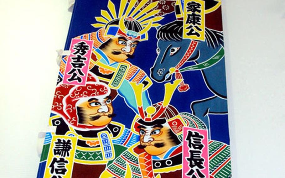A Japanese mural is among the many recent additions to Yokota’s Air Mobility Command passenger terminal. Walls were barren when the facility reopened last December following a $1.7 million renovation, so officials decided to add some cultural flavor to the Western Pacific’s largest airlift hub.