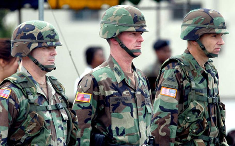 From left, outgoing commander of the 2nd Infantry Division's Division Artillery Col. Ross E. Ridge, 2nd ID commander Maj. Gen. George A. Higgins and Fires Brigade commander Col. Matt R. Merrick attend a ceremony on Camp Stanley on Wednesday to redesignate the Division Artillery as the Fires Brigade.