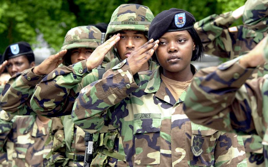 Members of the U.S. Army's 8th Personnel Command salute during an inactivation ceremony Wednesday at Yongsan Garrison.