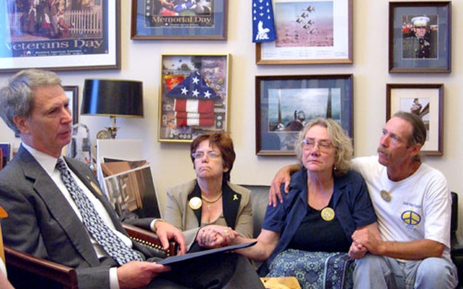 Rep. Walter Jones, R-N.C., left, speaks to members of Military Families Speak Out about his experience at a soldier’s funeral last month. With him are, from left, Dianne Davis Santorello, Celeste Zappala and Bill Mitchell. All three had a son killed serving in Iraq.