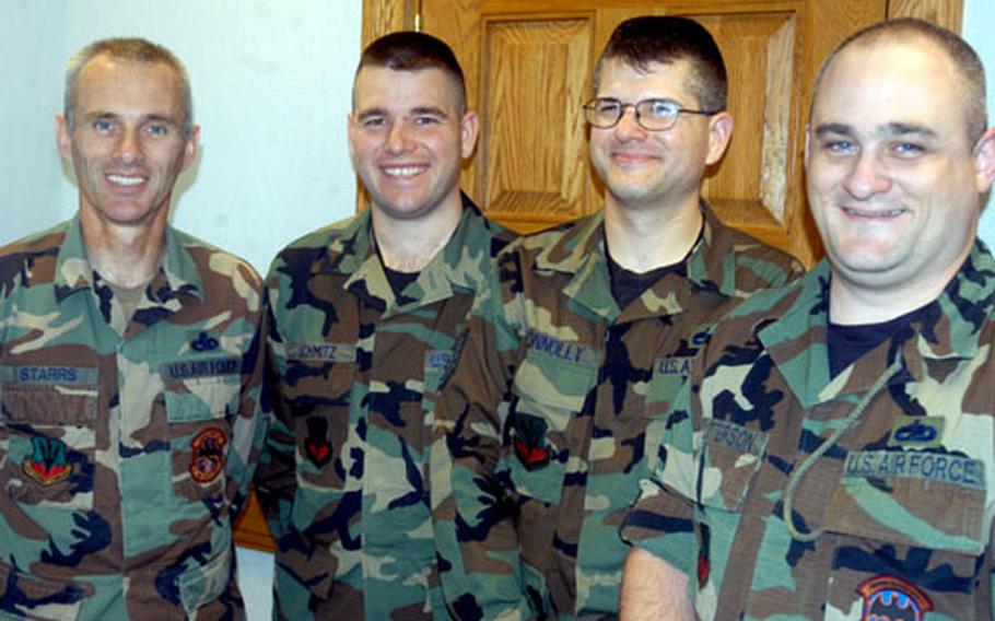 Three members of the 488th Intelligence Squadron at RAF Mildenhall, England, will travel by bicycle from the southwest tip of England to the northern tip of the Scottish mainland to raise money for the Make-A-Wish Foundation. The riders are, from left, Master Sgt. Kevin Starrs, Tech Sgt. Glenn Schmitz and Tech Sgt. Patrick Connolly. Tech Sgt. Mike Patterson, far right, will travel along in a van carrying supplies and camping equipment for the 1,000-mile journey.