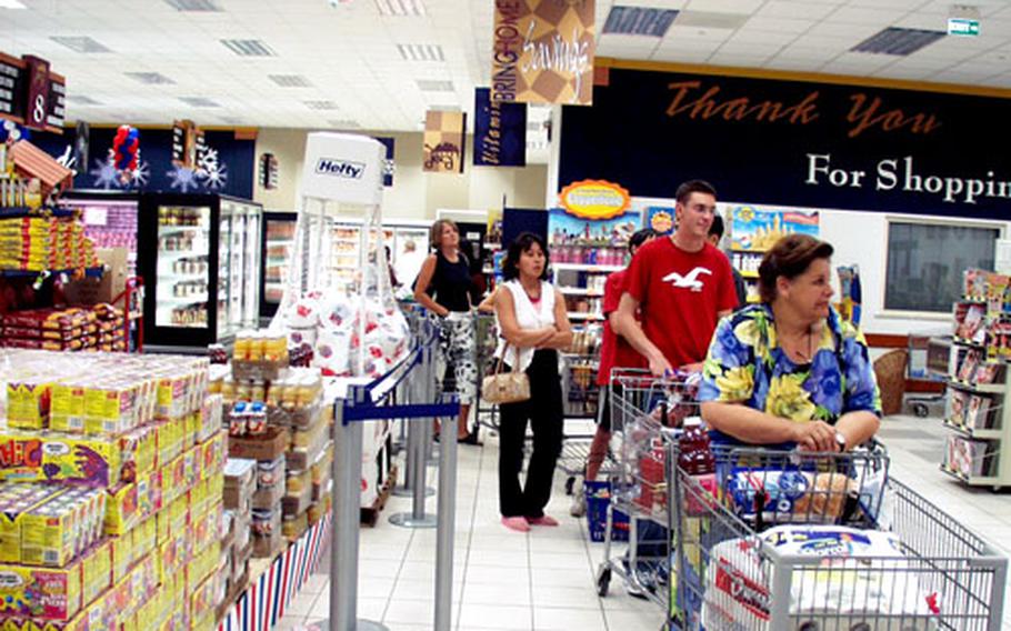 Customers waited in a longer-than-usual line Tuesday at the commissary at the Gricignano Support Site Navy base in Naples, Italy, after Italian employees at the commissary went on strike about 11 a.m.
