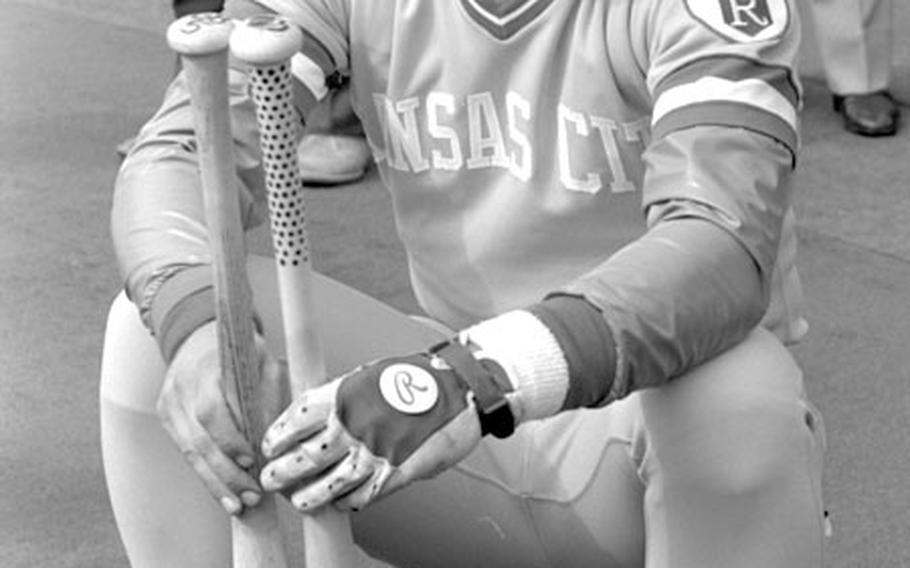 George Brett of the Kansas City Royals checks out some bats during a 1981 workout at Tokyo's Korakuen Stadium ...
