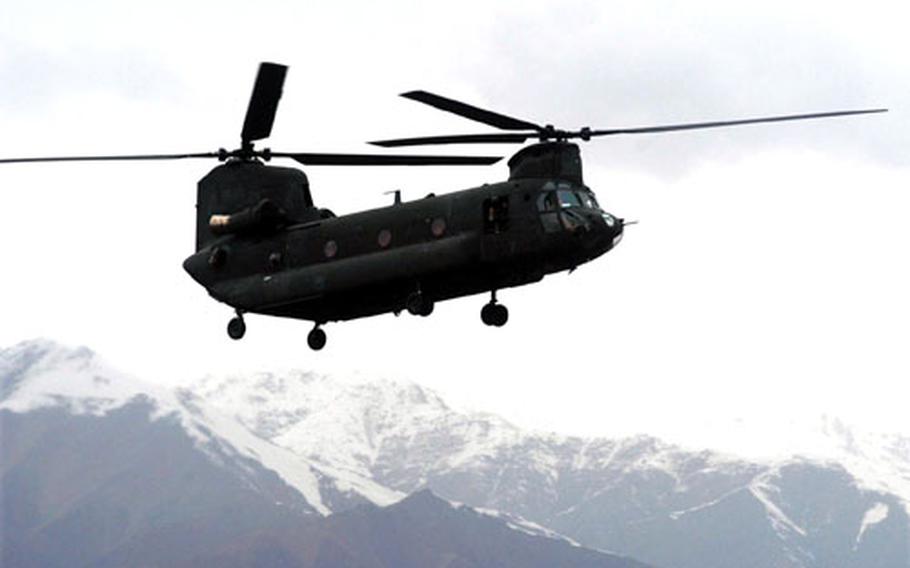 A CH-47 Chinook helicopter comes in for a landing near Charikar, Afghanistan last month. A special operations Chinook with 17 servicemembers aboard went down near Asadabad on Tuesday night, apparently from enemy fire.
