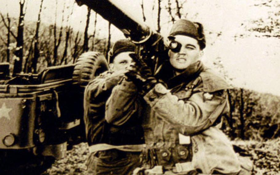 A photo at the Grafenwöhr military museum's summer exhibit shows Elvis Presley sighting in a bazooka at the Grafenwöhr training area, where he was stationed for a while in 1958.