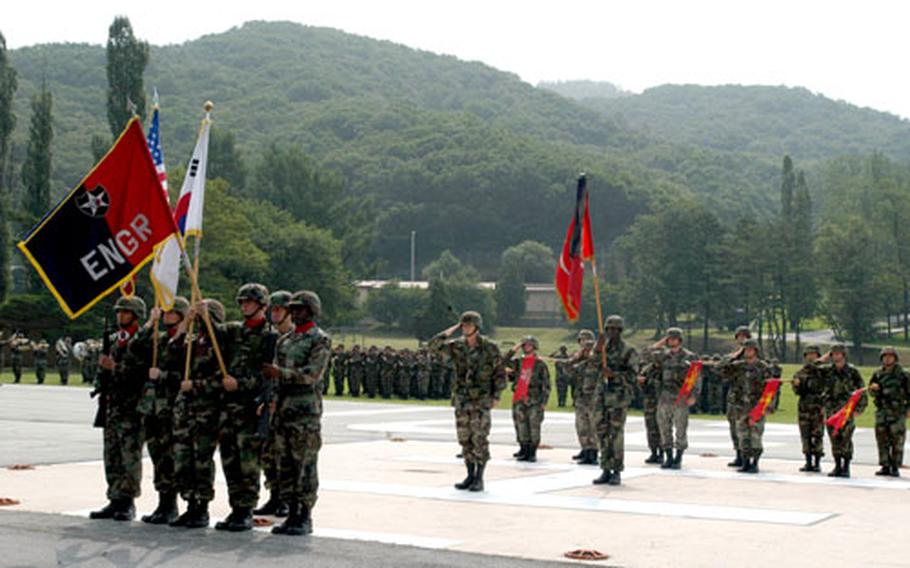Engineer Brigade units parade with their colors Friday for the last time at Camp Casey, South Korea.