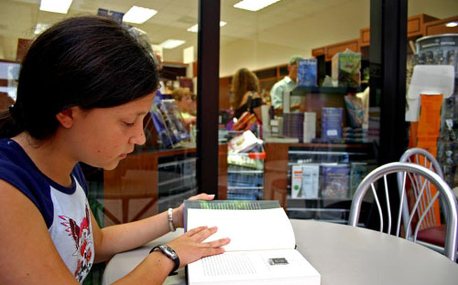 Kalena Hammond, 11, couldn’t wait to get home Saturday morning to read the newest “Harry Potter” installment. So moments after buying the book, she sat outside the Navy Exchange Bookstore at Naval Support Activity Naples, Italy, and began reading.