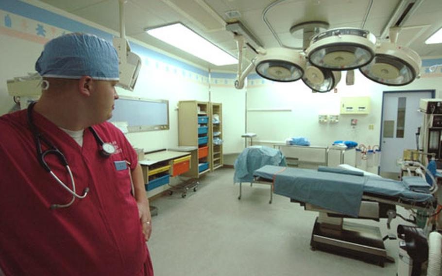 Hospital Corpsman Gary Darr looks at the refurbished obstetrics ward Friday at U.S. Naval Hospital Yokosuka, at Yokosuka Naval Base, Japan.