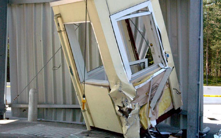 The guard’s booth at Grafenwöhr Training Area’s Gate 6 sits tilted and smashed several feet from its foundation after a Volkswagen van driven by a U.S. civilian crashed into the gate Saturday evening, killing 20-year-old Pond Security Service employee Alexander K. Schieder.