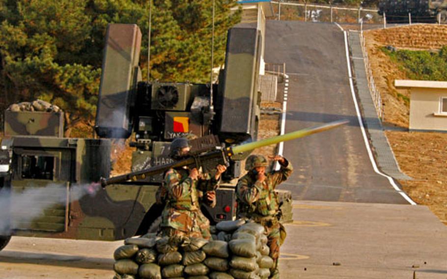 A 5th Battalion, 5th Air Defense Artillery Regiment soldier fires a Stinger missile in November at a target at Chulmae Range, South Korea.