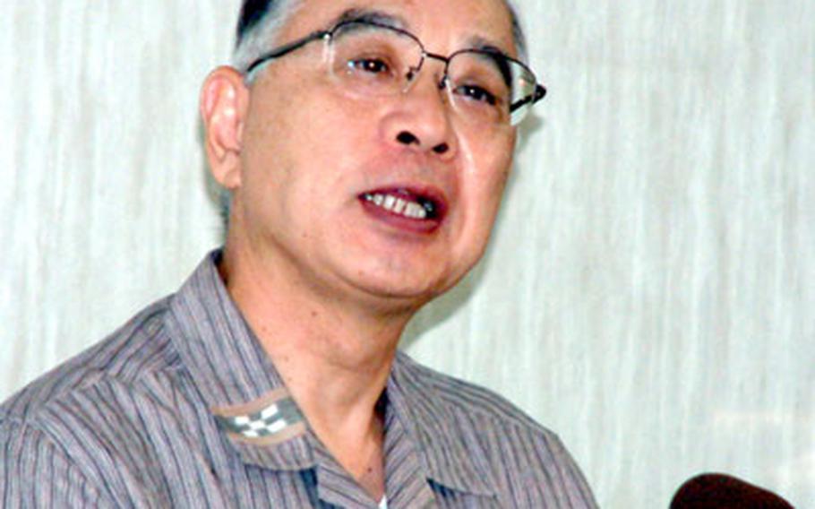 Yuji Miyamoto, special ambassador in charge of Okinawan affairs for Japan’s Ministry of Foreign Affairs, responds to reporters’ questions during a Friday news conference in Naha as he called for better notification of live-fire exercises.