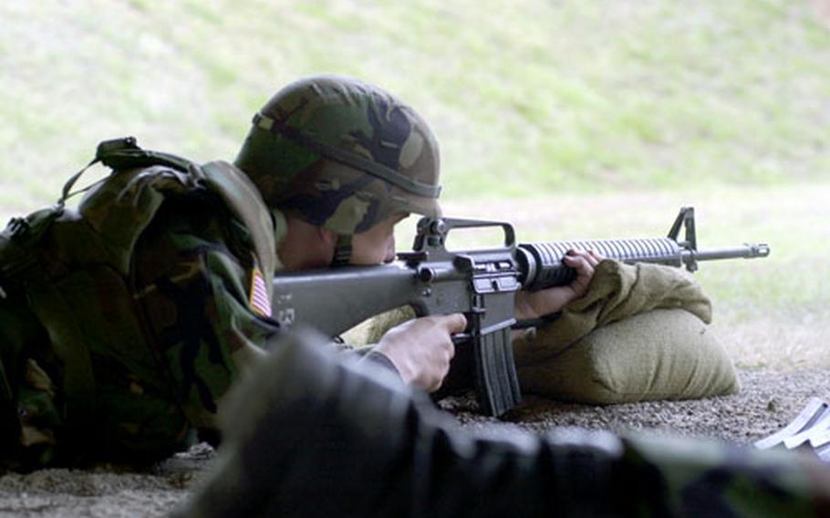 A soldier with the 5th Maintenance Company fires at a target last week at the Breintenwald 300-meter range in Landstuhl, Germany.