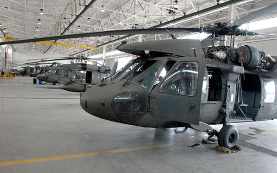 2nd Battalion, 2nd Aviation Regiment Black Hawks at rest in their new hangar at K-16. 2-2 soldiers are enjoying more freedom at their new home.