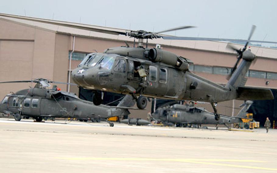 A Company C, 2nd Battalion, 2nd Aviation Regiment Black Hawk takes off for an air assault mission from K-16 on Tuesday.