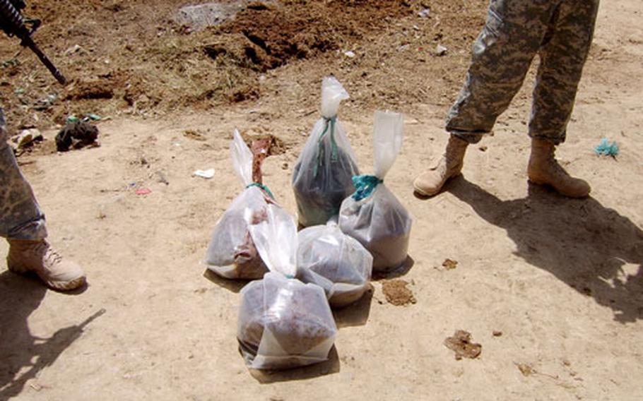 These five bags of unrefined heroin were found on a farm in the Arghandab district near Kandahar, Afghanistan, on Saturday by soldiers from 3rd Platoon, Company A, 1st Battalion, 325th Airborne Infantry Regiment. The drugs were estimated to be worth about $30 million.
