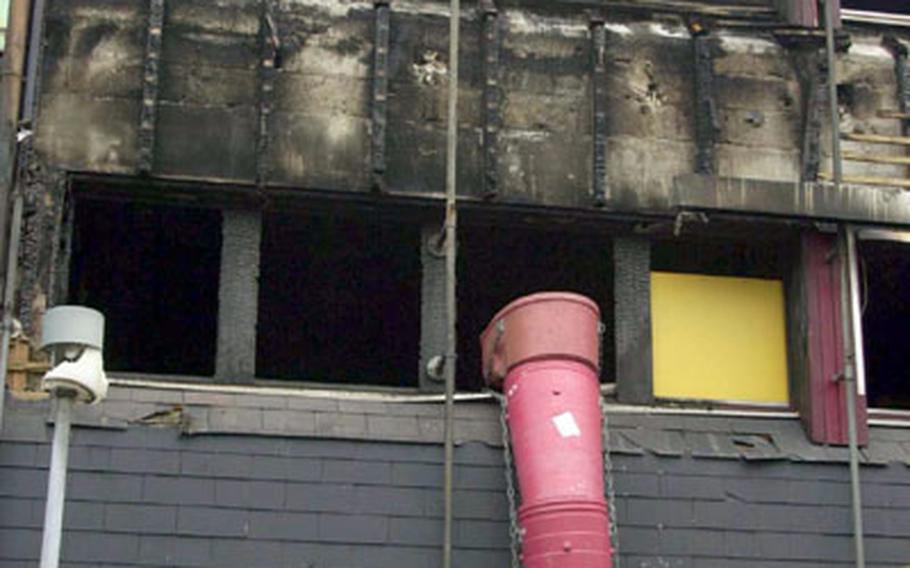 The second-story exterior of Baumholder's city government building was badly charred in an Aug. 11 fire that caused at least 1 million euros in damage. Two Baumholder, Germany-based soldiers are suspects in the blaze.