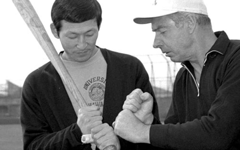 Joe DiMaggio talks hitting with Isao Itoh.