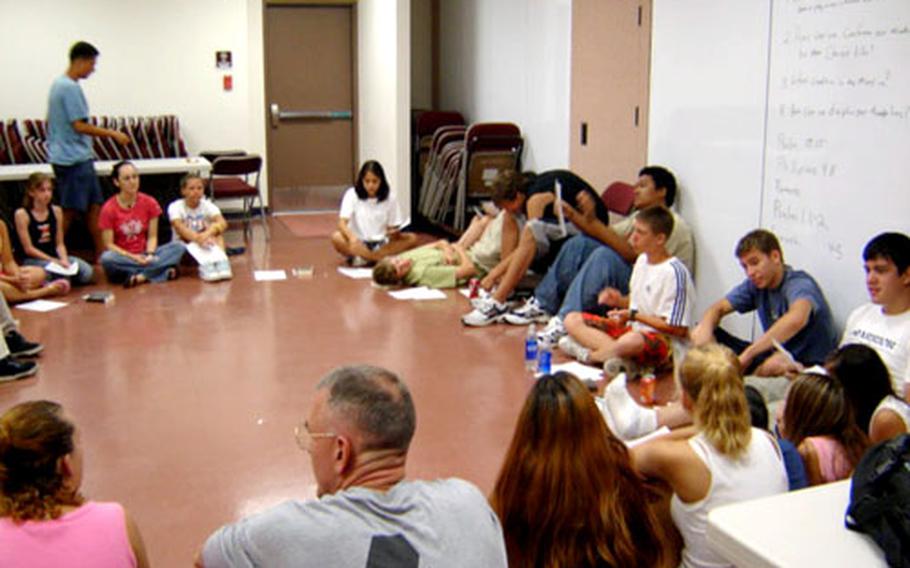 Teen-oriented Christian discussion groups like this one held this summer at Camp Walker in Daegu, South Korea, will be a regular part of a new program called Club Beyond that began operating at Camp Walker last month.