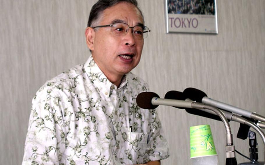 Yuji Miyamoto, ambassador in charge of Okinawan affairs for the Japanese Ministry of Foreign Affairs, talks to reporters Tuesday during a news conference in his Naha office.
