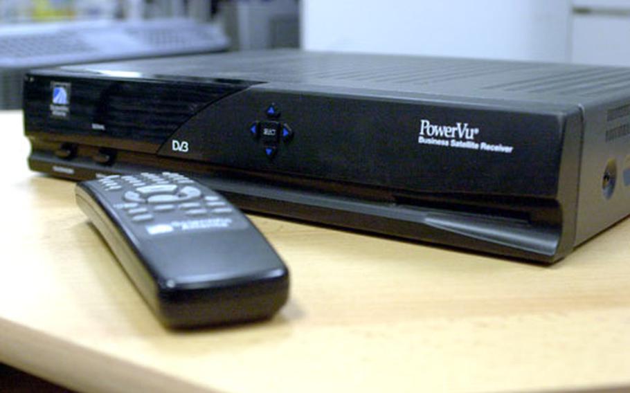 A Scientific Atlanta-made decoder that allows eligible Americans to receive American Forces Network programming. The Navy is finalizing plans that would provide free decoders to sailors living in Europe.