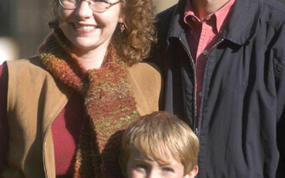 Maxwell Kunkle with his parents, Laura and Taylor Kunkle.