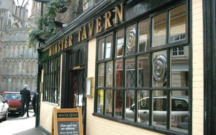 The Minster Tavern in Ely, just a stone's throw from the stately Ely Cathedral (in background).
