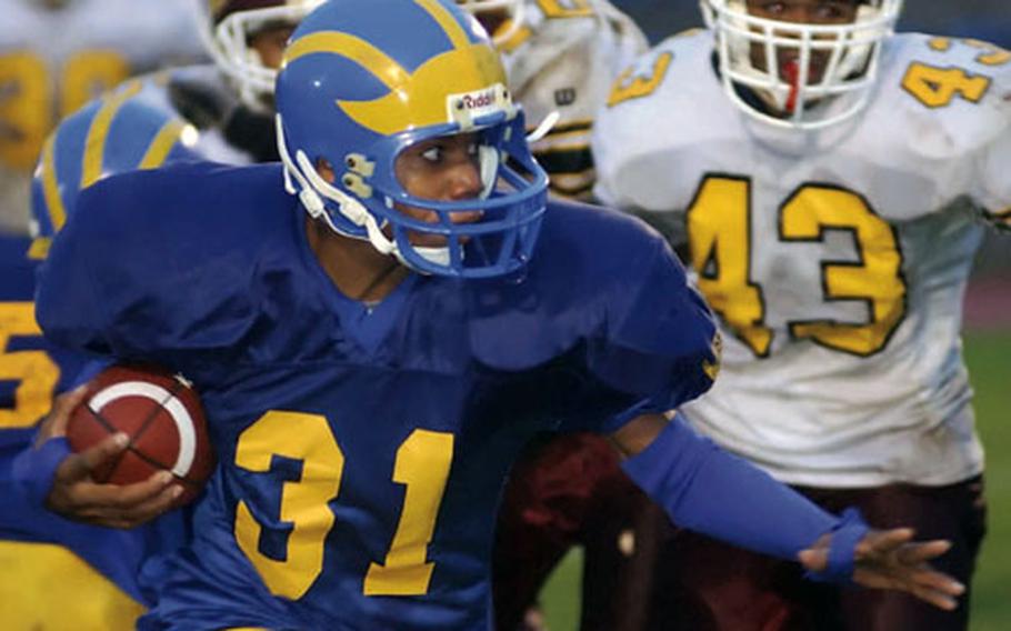 Ansbach’s Dominique Whaley (31) is pursued by Baumholder defenders during the DODDS-Europe Division III title game last year in Baumholder, Germany. Baumholder has hosted the Super Six championships since they started in 2003.