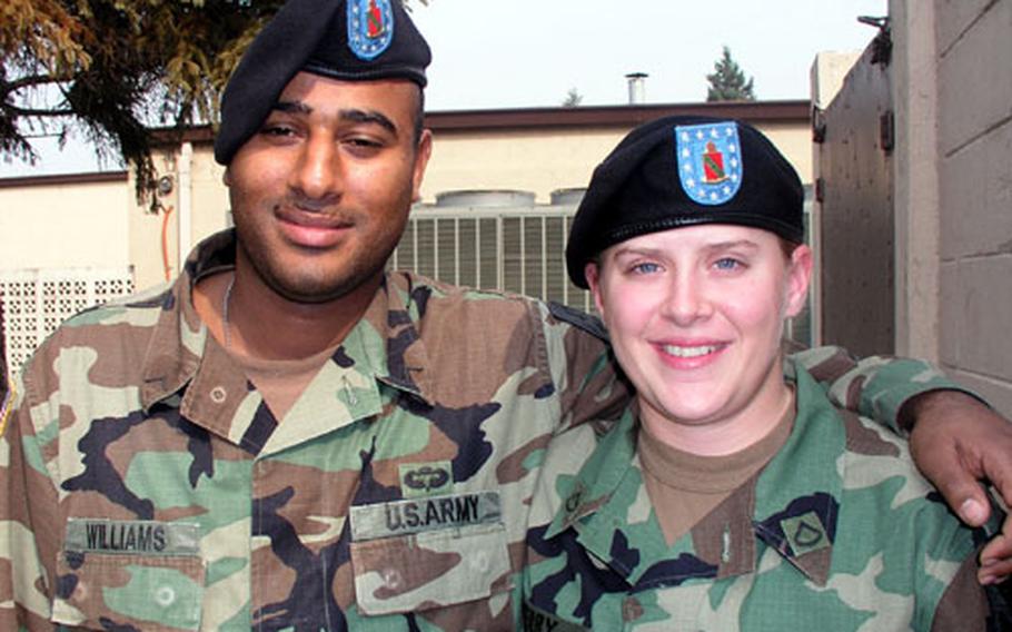 Pvt. Michael Williams, left, and Pfc. Wendy Terry were praised for their quick action in helping a fellow soldier injured in a work mishap last week.