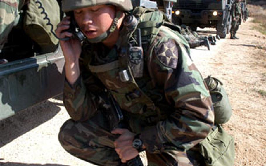 Platoon commander 2nd Lt. John Abella, 23, of Yorba Linda, Calif., calls for a medevac after an “improvised explosive device attack” during training in Warrior Valley on Monday.