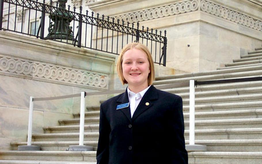 Katie Rember, shown here on the steps of the U.S. Capitol, is one of 30 teens working in the Senate this fall as part of the page program.