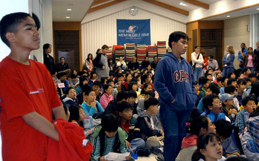 Eleven-year-old Michael Hichman, left, and Alexander Morgenstern, 11, are two of 29 students from Seoul American Middle School who attended classes at Seoul English Village last week.