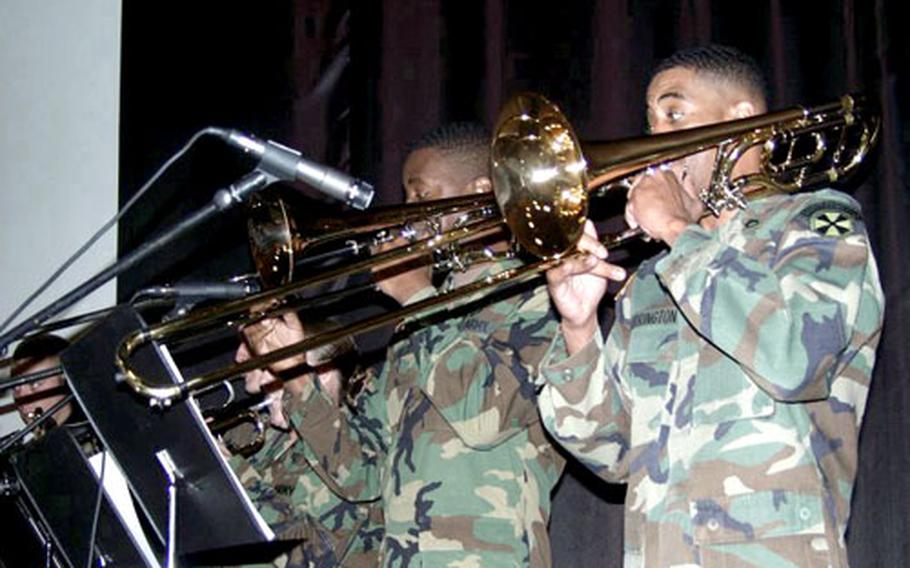 The horn section of the Eighth U.S. Army’s salsa combo perform last month at U.S. Army Troop Command Korea’s Hispanic Heritage celebration on Yongsan Garrison in Seoul.