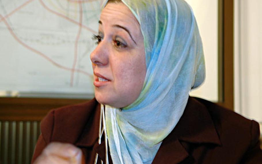 “Our hearts have been burned,” says Karada district advisory council chairwoman Taha Bushra. She and her colleagues on the elected council say they work hard to make local government accessible and helpful to the people of the area.