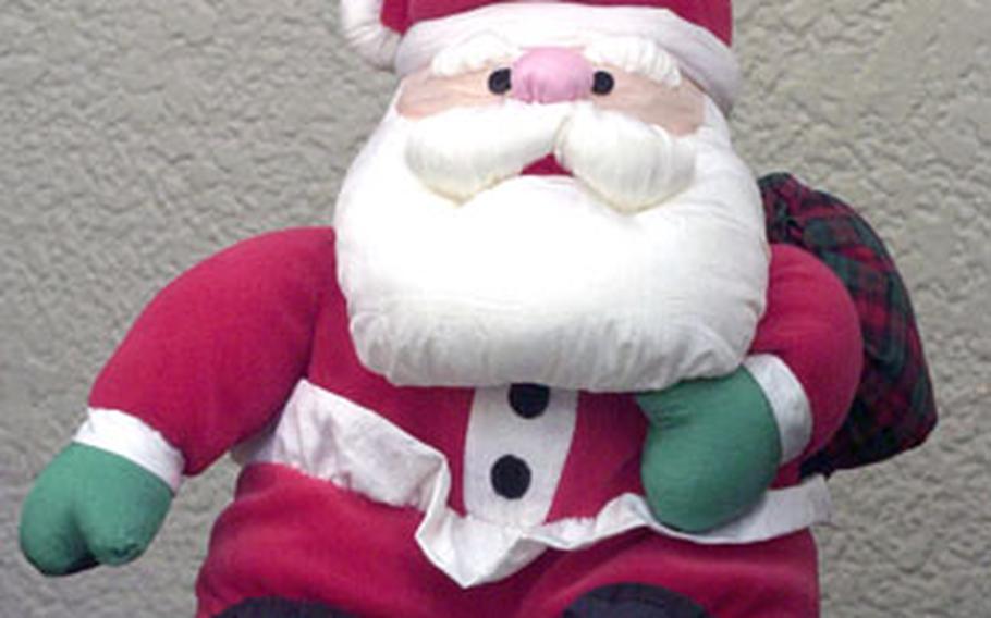 A $500 reward has been offered for the capture of this Santa, last seen somewhere on Yokosuka Naval Base, Japan. The contest to find the stuffed toy, set up by Morale Welfare and Recreation, begins Saturday.