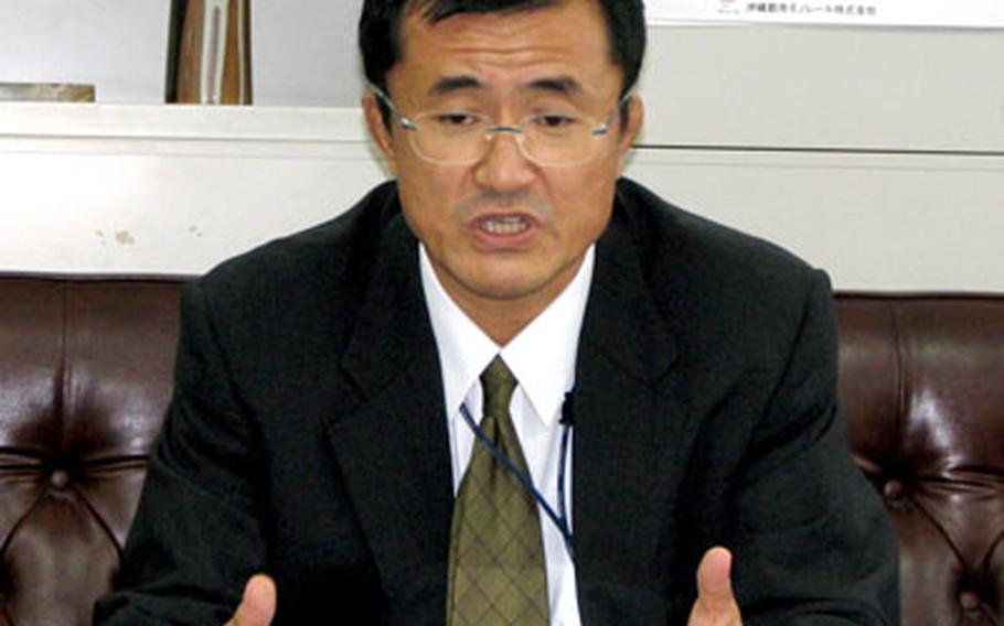 Koki Kitahara, director for Crisis Management in Okinawa, representing the national government, briefs reporters on Tuesday’s outcome of the first Japan-U.S. Meeting for Crisis Management on Okinawa.