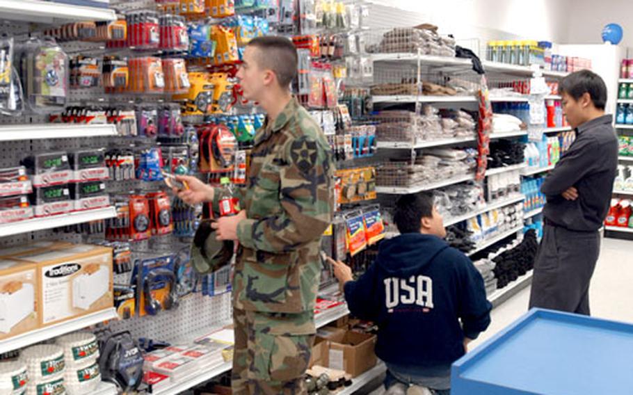 A soldier shops at the convenience store at the newly opened Rodriguez Range Post Exchange.