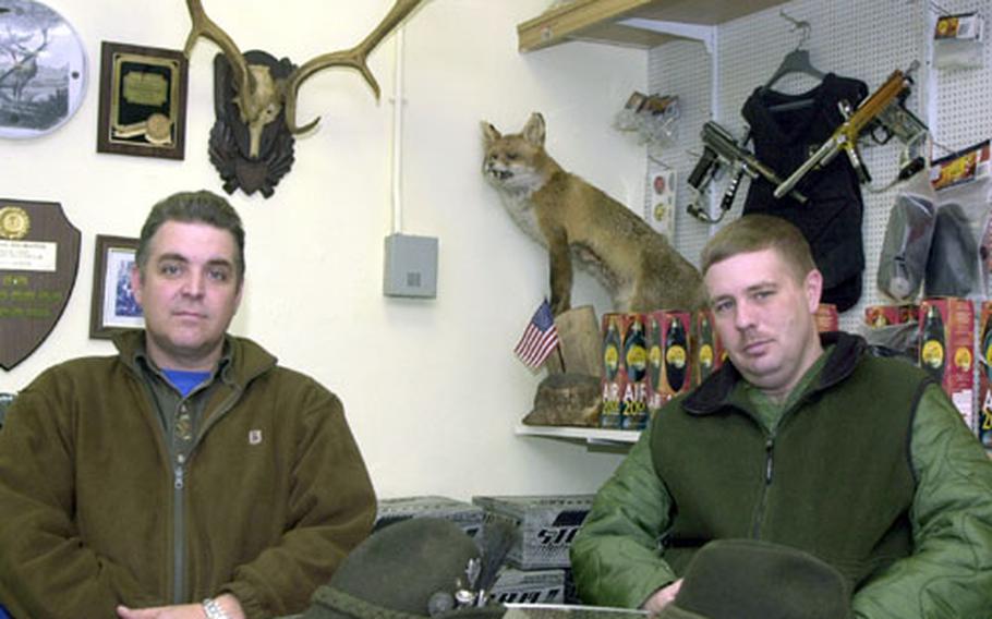 Myths about how it’s impossible for Americans to hunt in Germany never die, say Brandt Gardner, left, Baumholder’s Rod and Gun Club director. In fact, it takes just a couple of months to pass the hunting test and to get hunting guns cleared, said Capt. Paul Templeton, right, who’s been hunting in the area for a year.