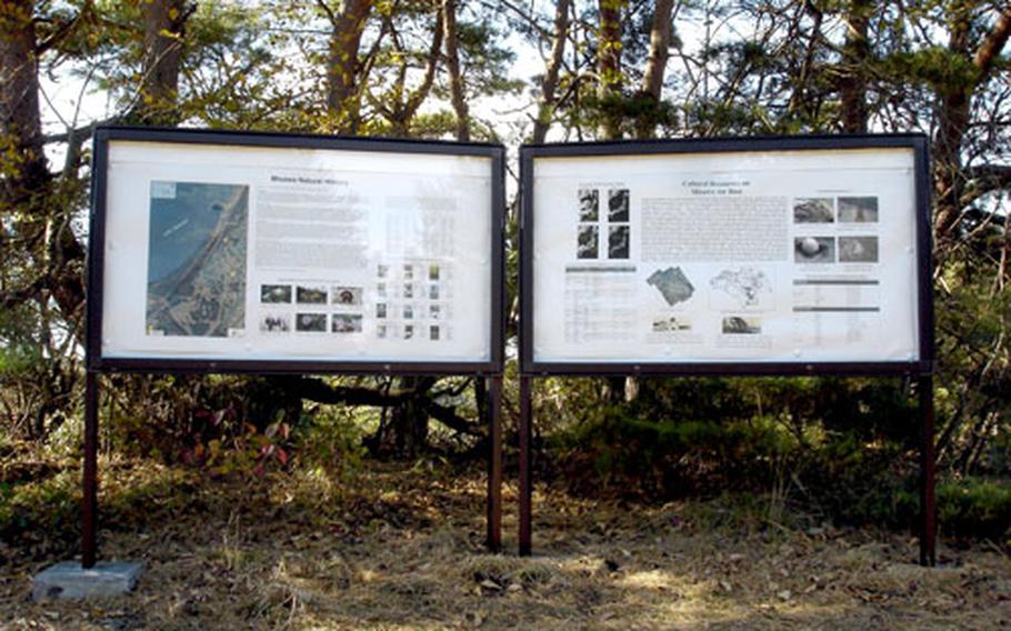 Two glass-encased signboards describing the base’s natural and cultural resources mark the beginning of Misawa Air Base’s 1.24-mile nature trail.