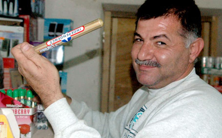 Aouf “Alf” Hasoon tends to business at his tiny market in Forward Operating Base Tiger in Sinjar, Iraq. The interpreter began working with Tiger Squadron, 3rd Armored Cavalry Regiment, during the 2003 invasion and returned to the unit this year, even after he was wrongly detained at Abu Ghraib prison for eight months.