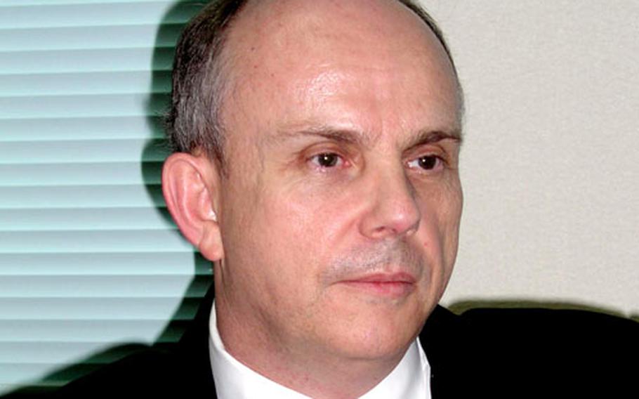 Joseph R. Donovan Jr., deputy chief of mission at the U.S. Embassy in Tokyo, speaks to reporters Thursday before completing his three-day tour to Okinawa, the first visit to the island since he assumed the post in August.