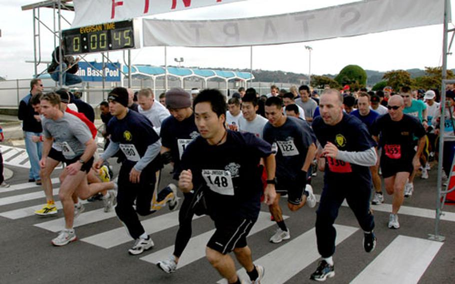 More than 300 runners and walkers start the first annual Surface Navy Association-Japan Maritime Self-Defense Forces Family 5K Fun Run and Walk at Sasebo Naval Base, Japan, on Friday.